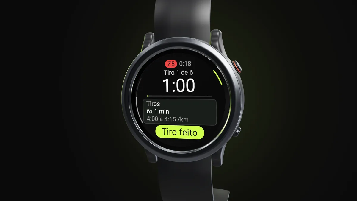 Relógio Garmin com o app da Welltrainer no tiro 1 de 6 de um treino intervalado, na zona 5, com o cronômetro em 1:00
